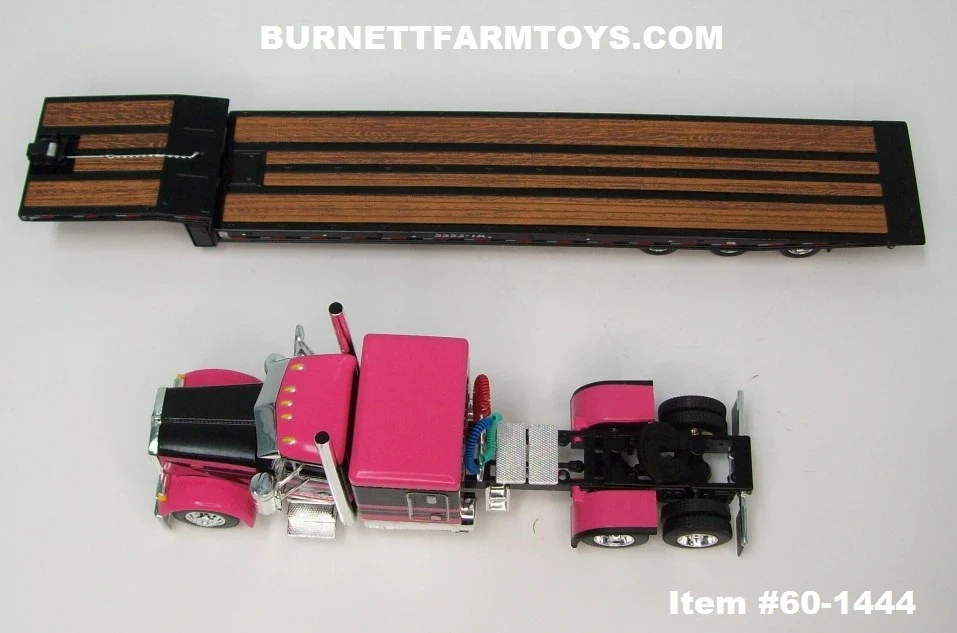 Item #60-1444 Pink Black Peterbilt 379 63-inch Flattop Sleeper with Black Tri-Axle Talbert 5553TA Slide Axle Flatbed Trailer - 1/64 Scale - DCP by First Gear - Image 4