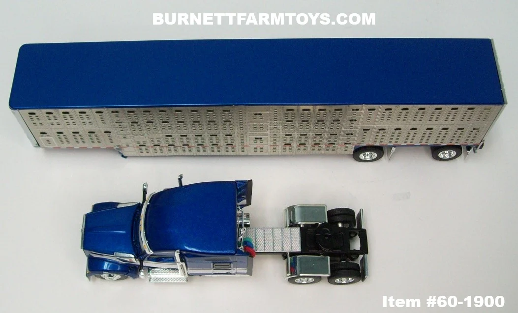 Item #60-1900 Blue Metallic White Kenworth W990 76-inch Mid Roof Sleeper with Silver Sided Blue Metallic Trim Spread Axle Wilson Silver Star Livestock Trailer - 1/64 Scale – DCP by First Gear - Image 4