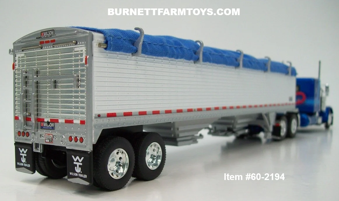 Item #60-2194 Two-Toned Blue Silver Outline Peterbilt 379 48-inch Flattop Sleeper with White High Sided Blue Tarp Silver Frame Tandem Axle Wilson Pacesetter Hopper Bottom Grain Trailer - 1/64 Scale – DCP by First Gear - Image 2