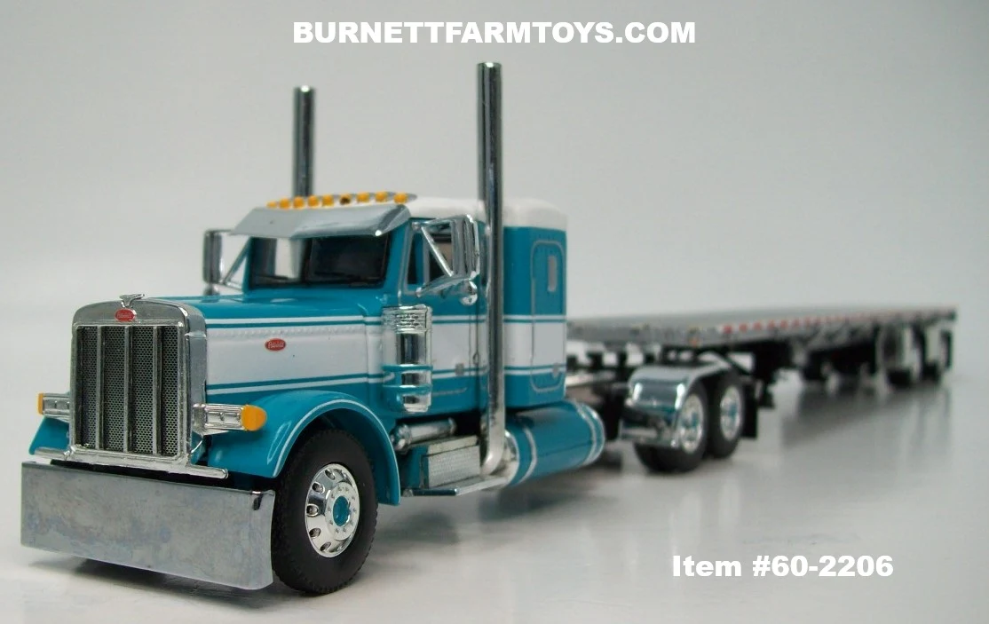 Item #60-2206 White Turquoise Peterbilt 379 36-inch Flattop Sleeper with Silver Deck Black Frame Spread Axle Wilson Roadbrute 53-foot Flatbed Trailer - 1/64 Scale – DCP by First Gear