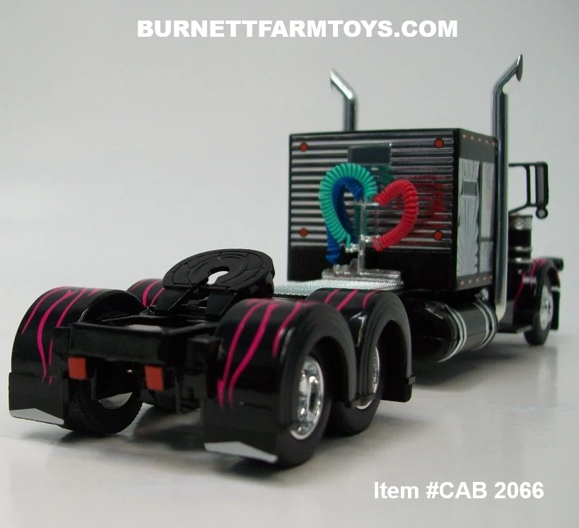 Item #CAB 2066 Black Pink Flame Peterbilt 389 60-inch Chrome Black Trim Vintage Flattop Sleeper - 1/64 Scale – DCP by First Gear - Image 2